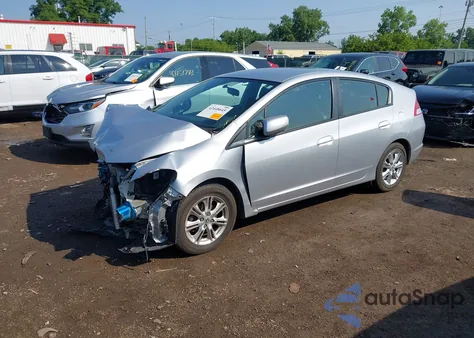 2010 Honda Insight Ex z USA, uszkodzony, nr VIN JHMZE2H77AS037072